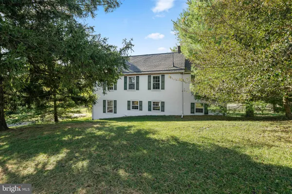 a view of a house with a big yard