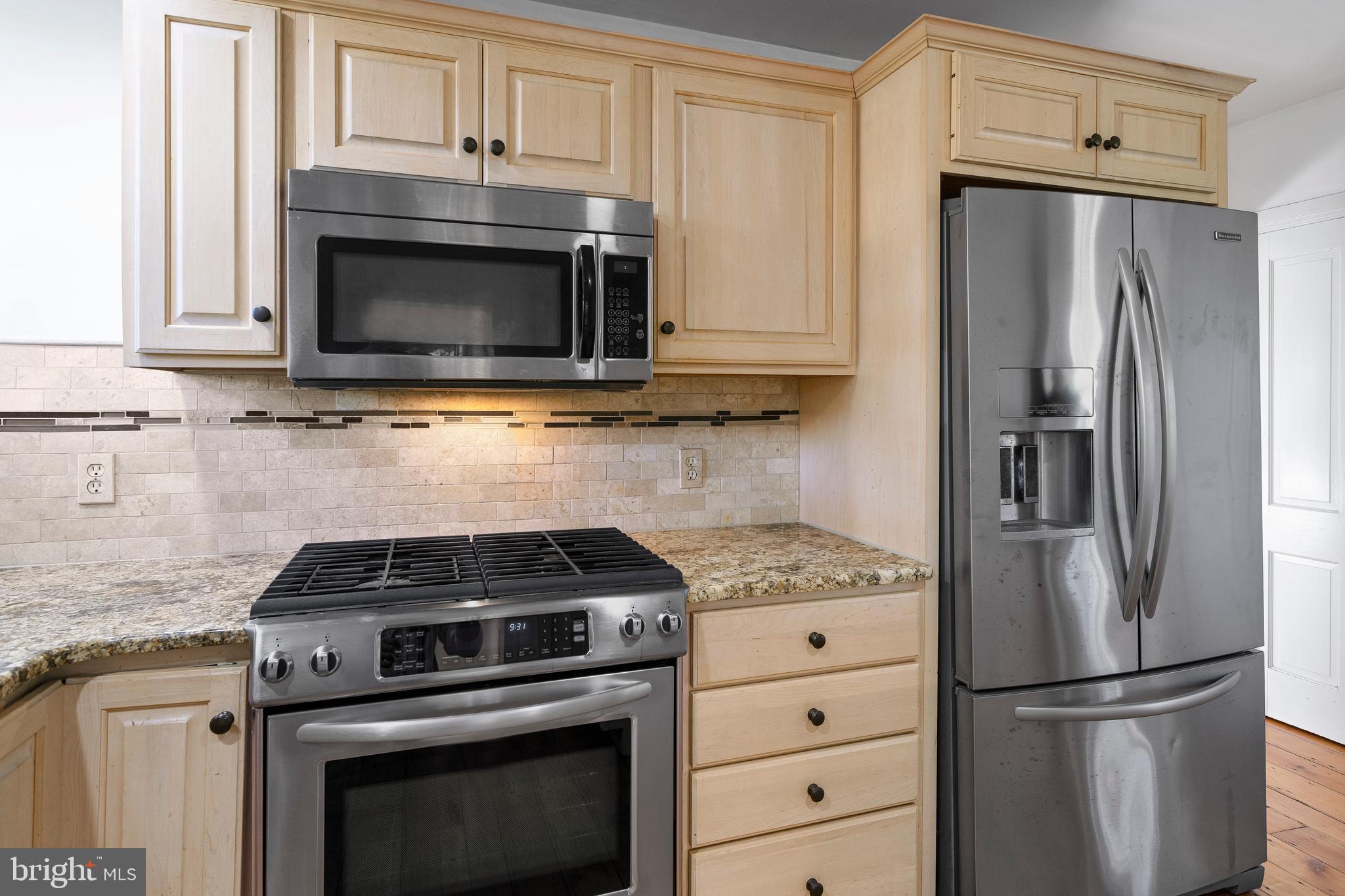 1025 North Chatham Road West Grove, PA 19390 - Photo 10 of 44 a kitchen with cabinets stainless steel appliances and a counter space