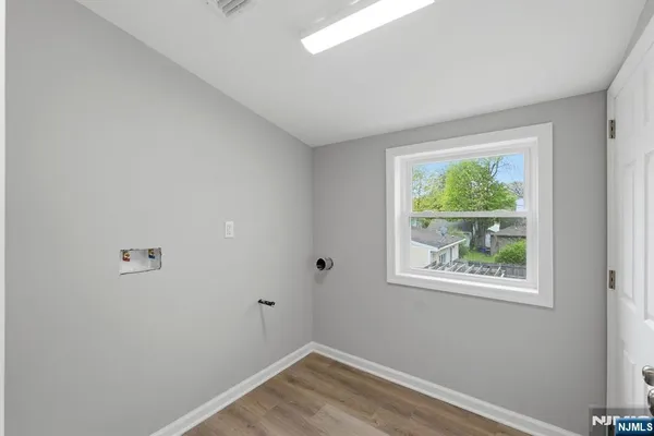 a view of a room that has a window in it