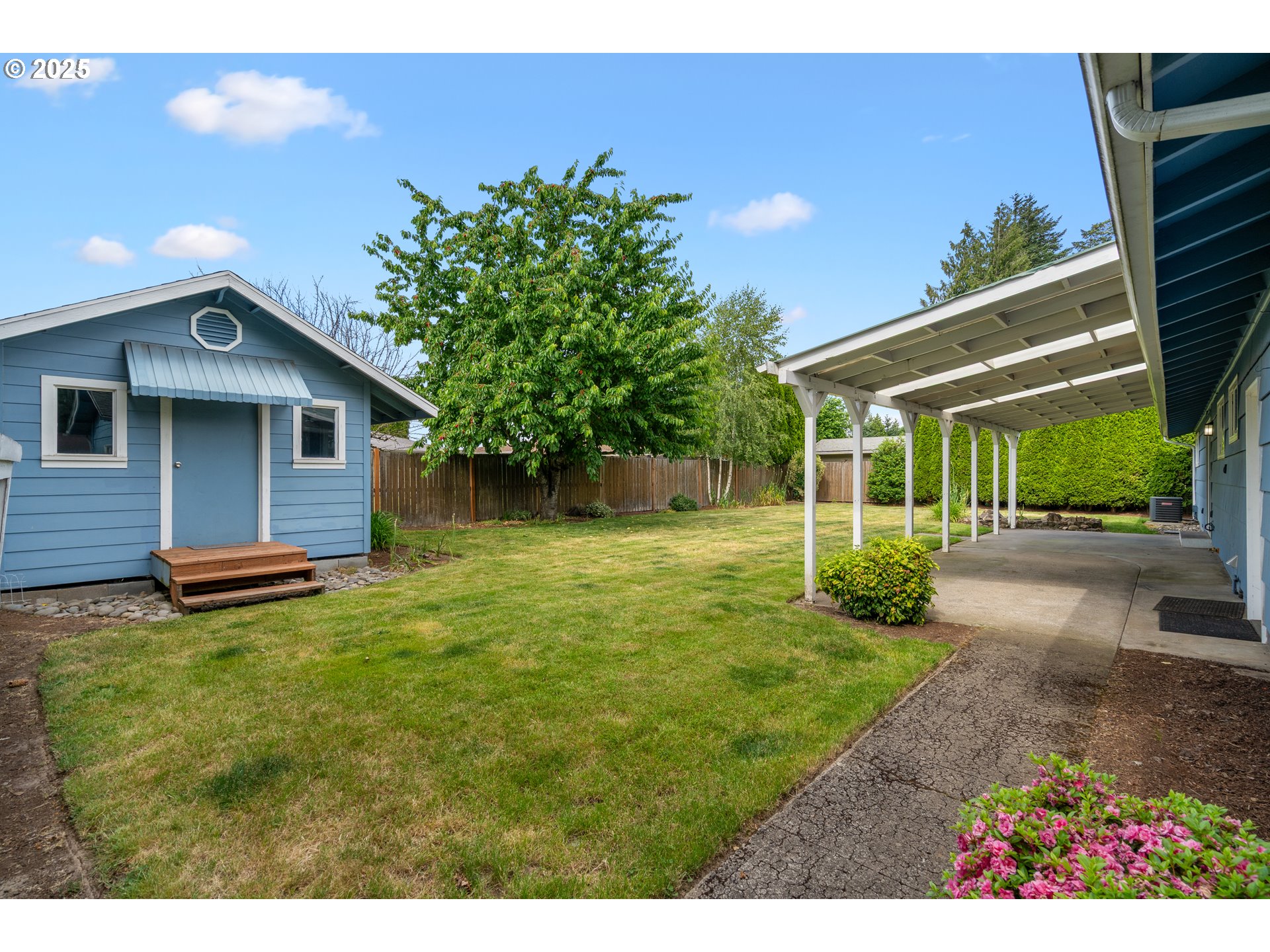 1897 Chelan Street Northeast Keizer, OR 97303 - Photo 29 of 39 a view of a house with a yard