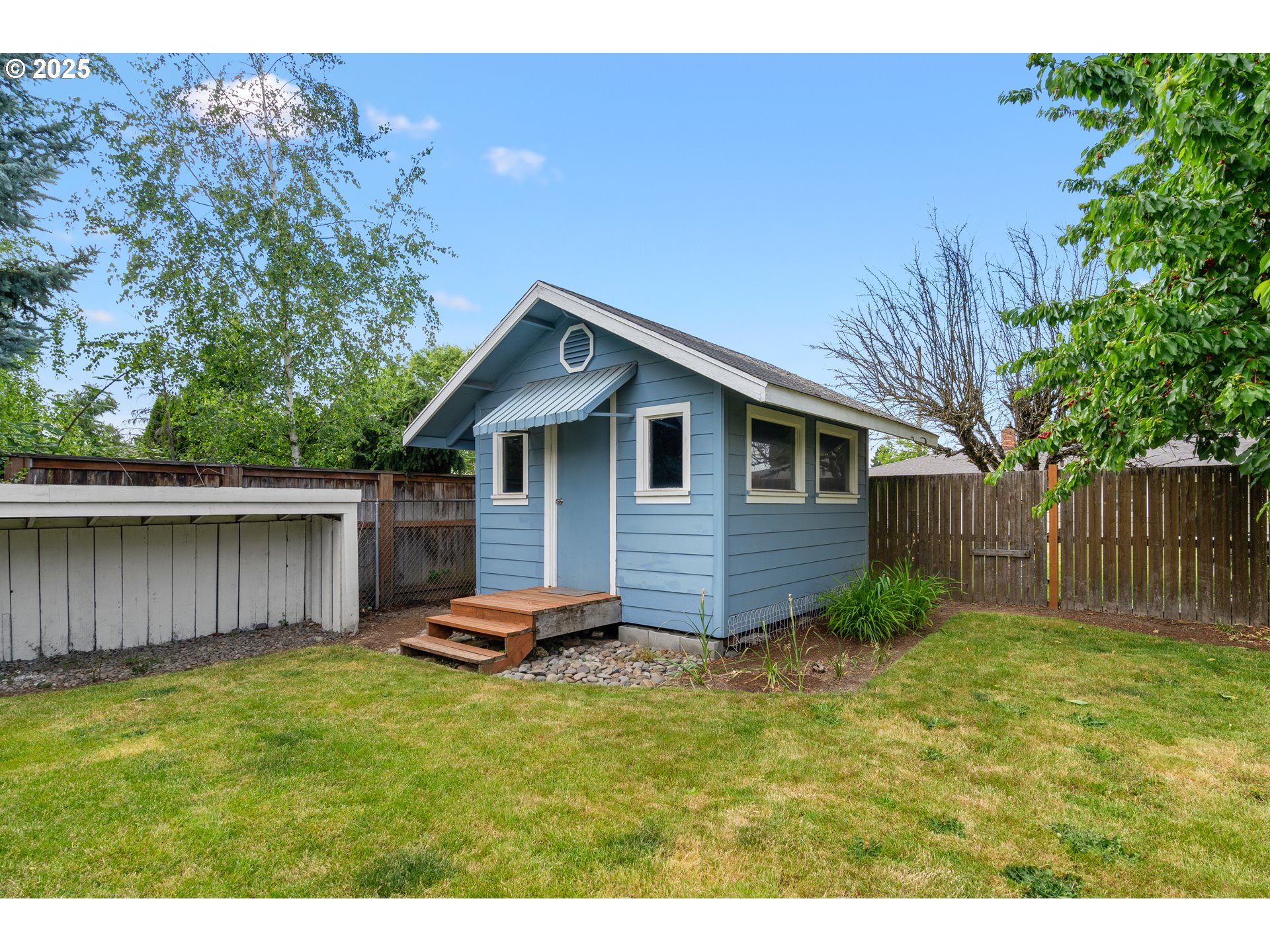 1897 Chelan Street Northeast Keizer, OR 97303 - Photo 30 of 39 a backyard of a house with lots of green space