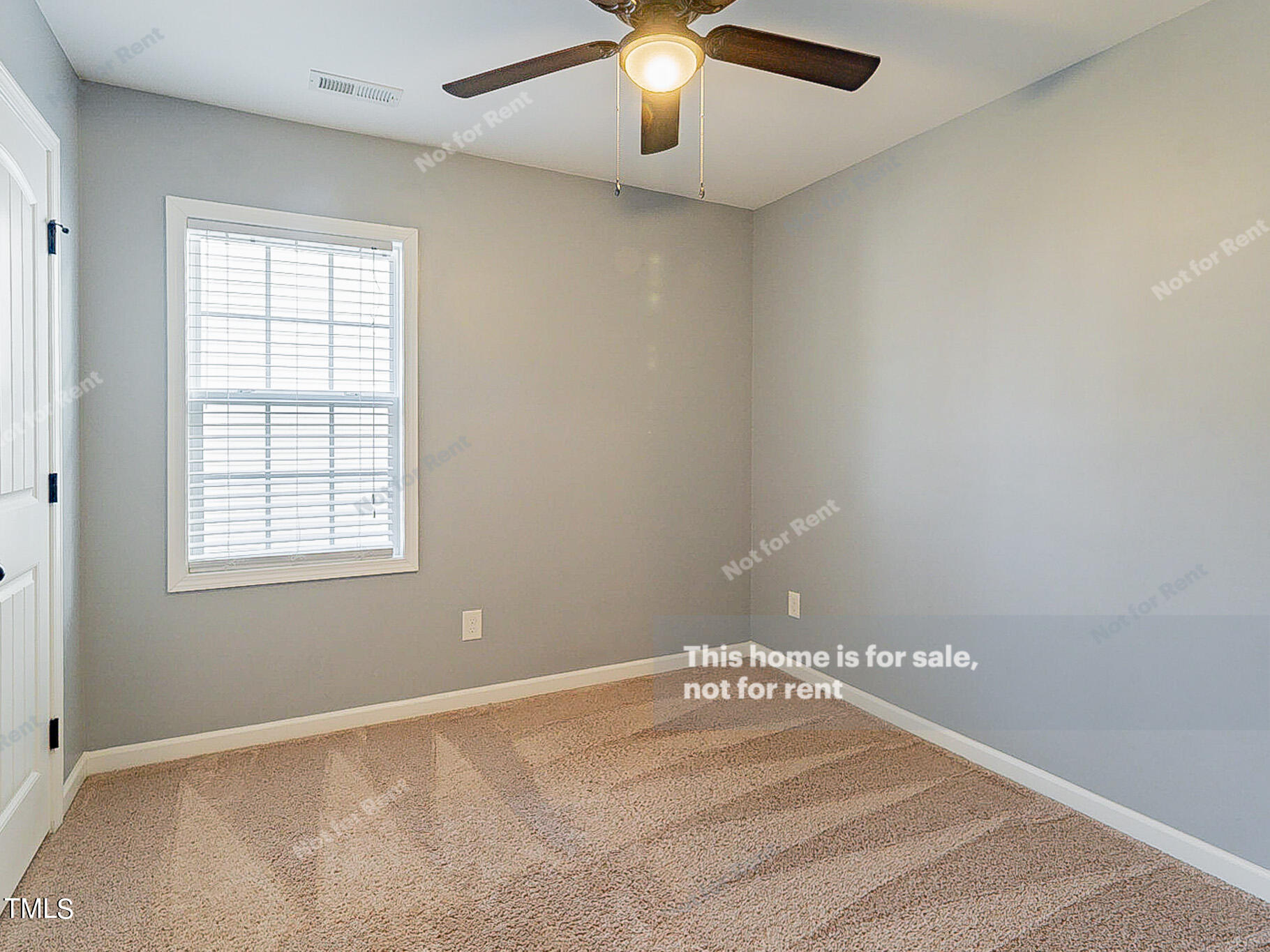 191 Verrazano Place Clayton, NC 27520 - Photo 15 of 28 a view of an empty room with a window