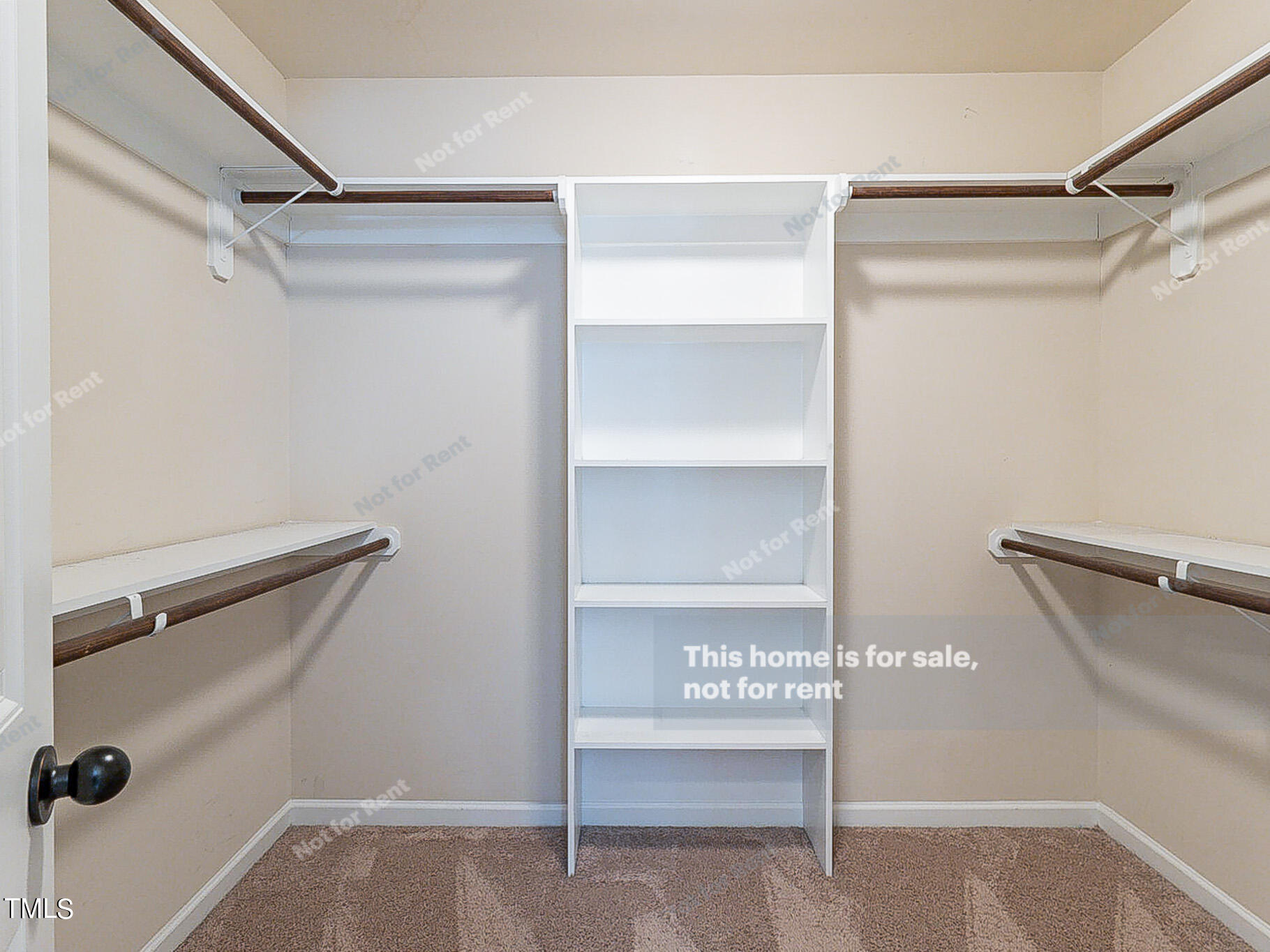 191 Verrazano Place Clayton, NC 27520 - Photo 23 of 28 a view of a room with racks on the wall