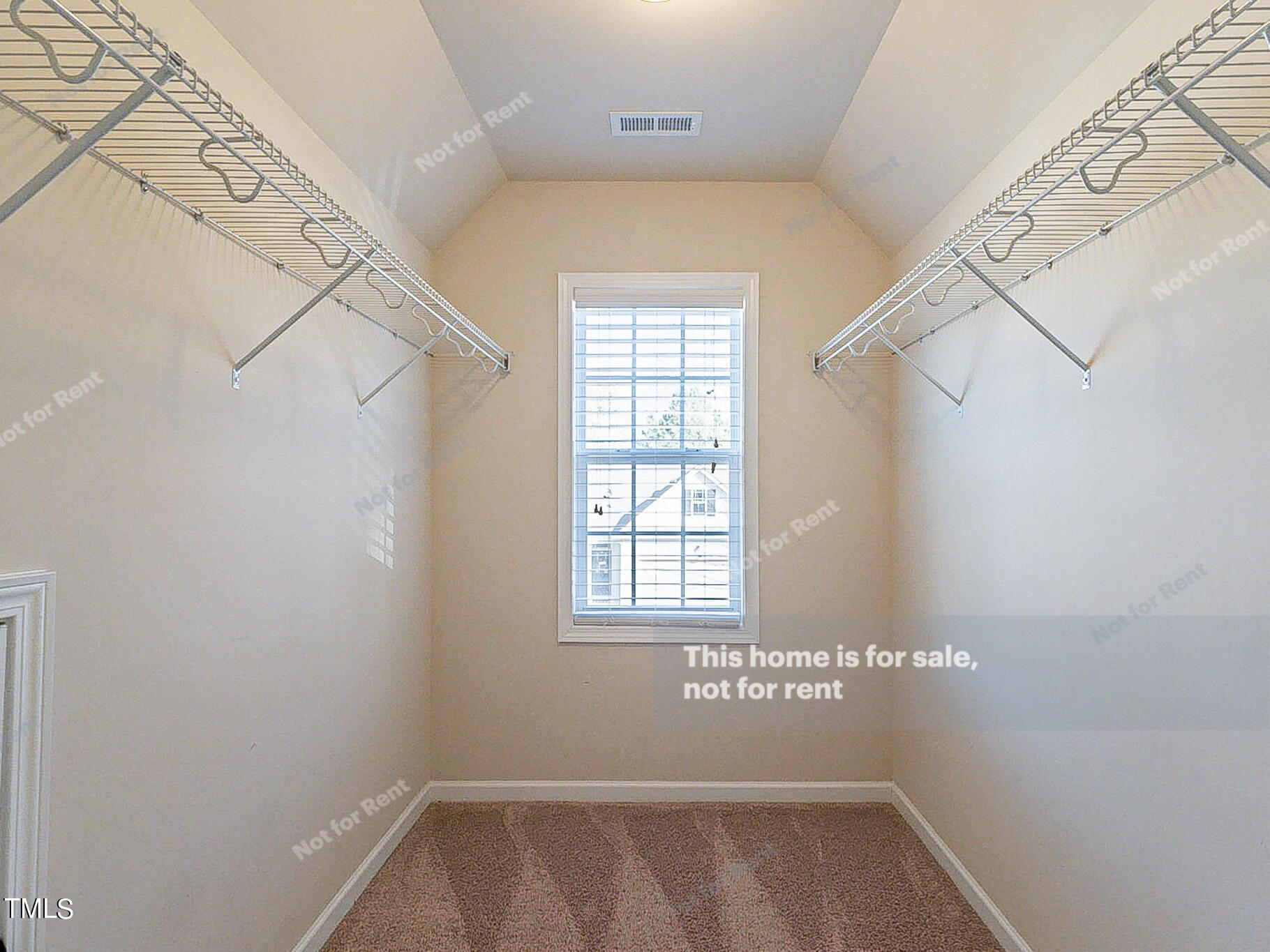 191 Verrazano Place Clayton, NC 27520 - Photo 24 of 28 a view of a window in an empty room