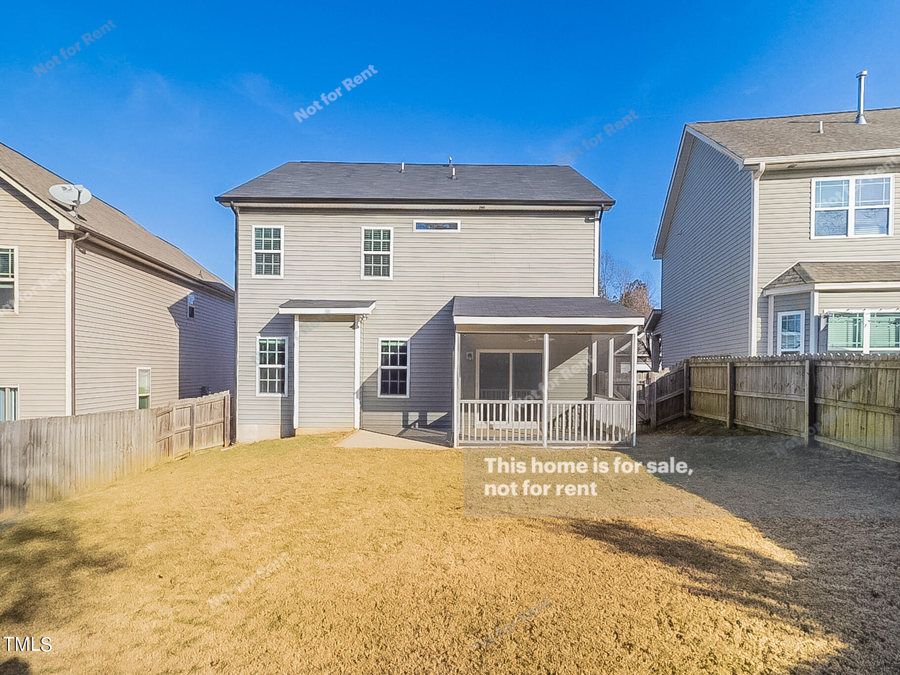 191 Verrazano Place Clayton, NC 27520 - Photo 27 of 28 a front view of a house with a yard and table and chairs