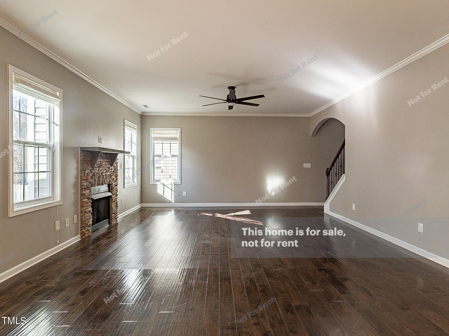 191 Verrazano Place Clayton, NC 27520 - Photo 5 of 28 a view of an empty room with wooden floor and a window
