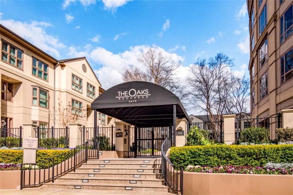 3475 Oak Valley Road Northeast, Unit 1630 Atlanta, GA 30326 - Photo 2 of 38 a view of a building with a street