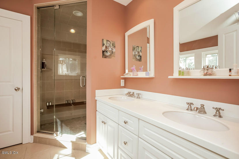 10 Palmer Terrace Riverside, CT 06878 - Photo 15 of 21 a bathroom with a sink and a mirror