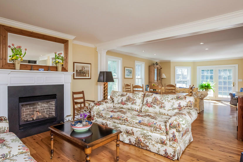 10 Palmer Terrace Riverside, CT 06878 - Photo 5 of 21 a living room with furniture and a fireplace