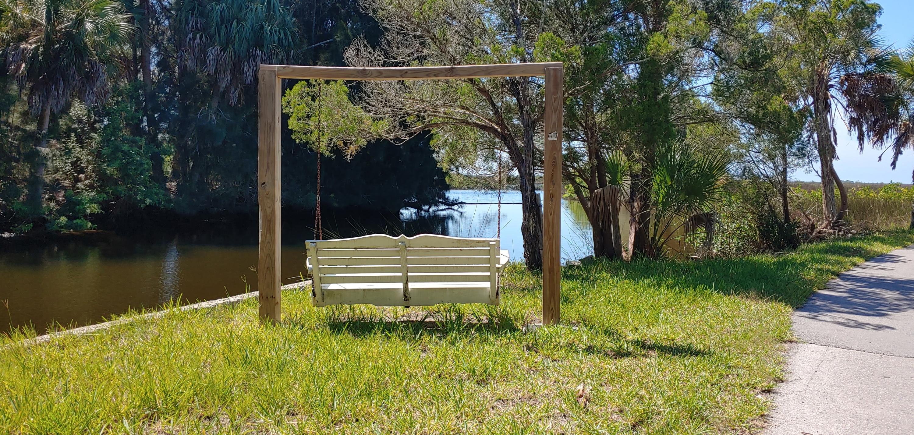 shine land canal and porch swing