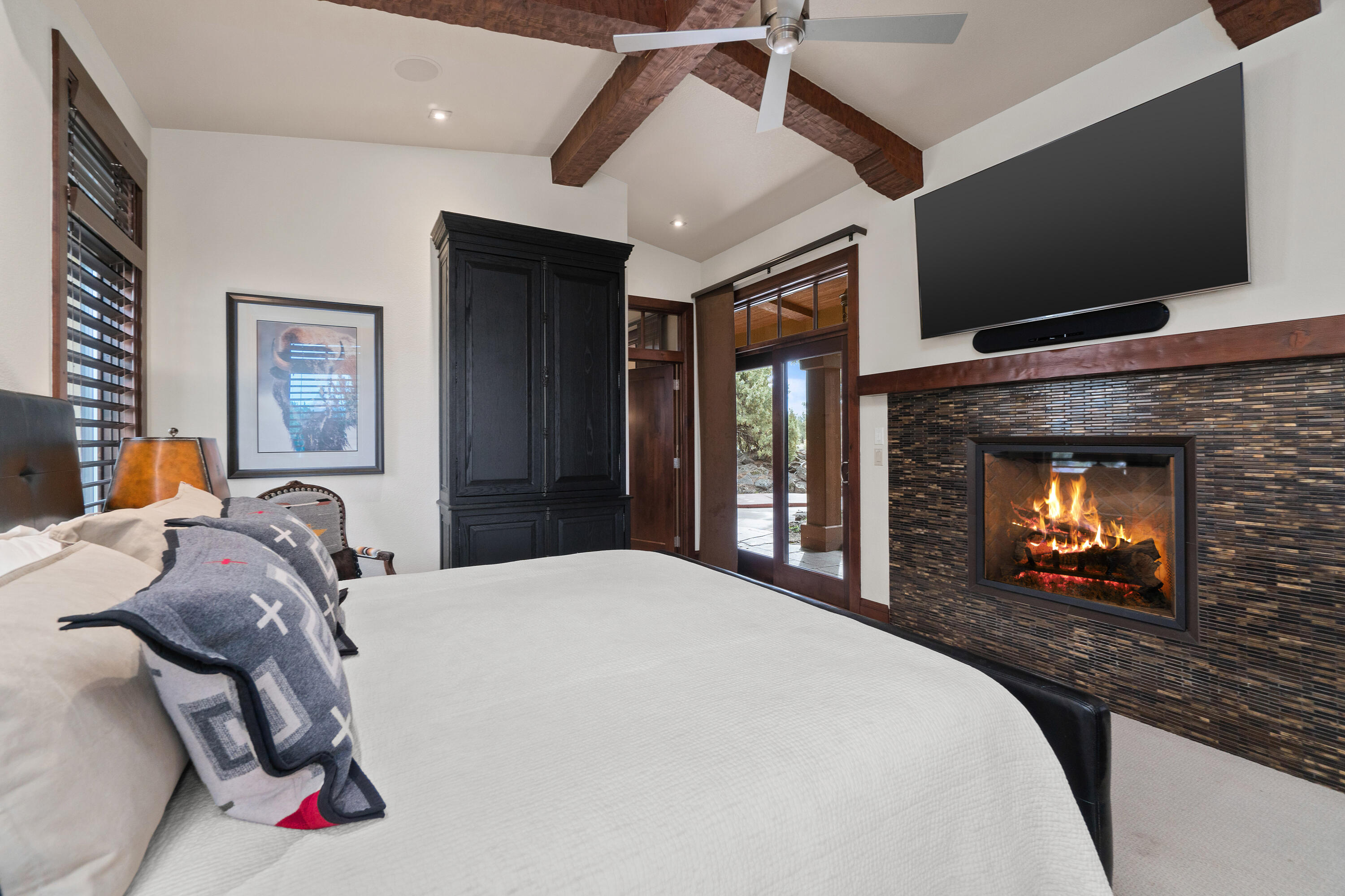 65904 Fazio Ln Bend Bend, OR 97701 - Photo 26 of 63 Cozy gas fireplace and direct access out to back patio.