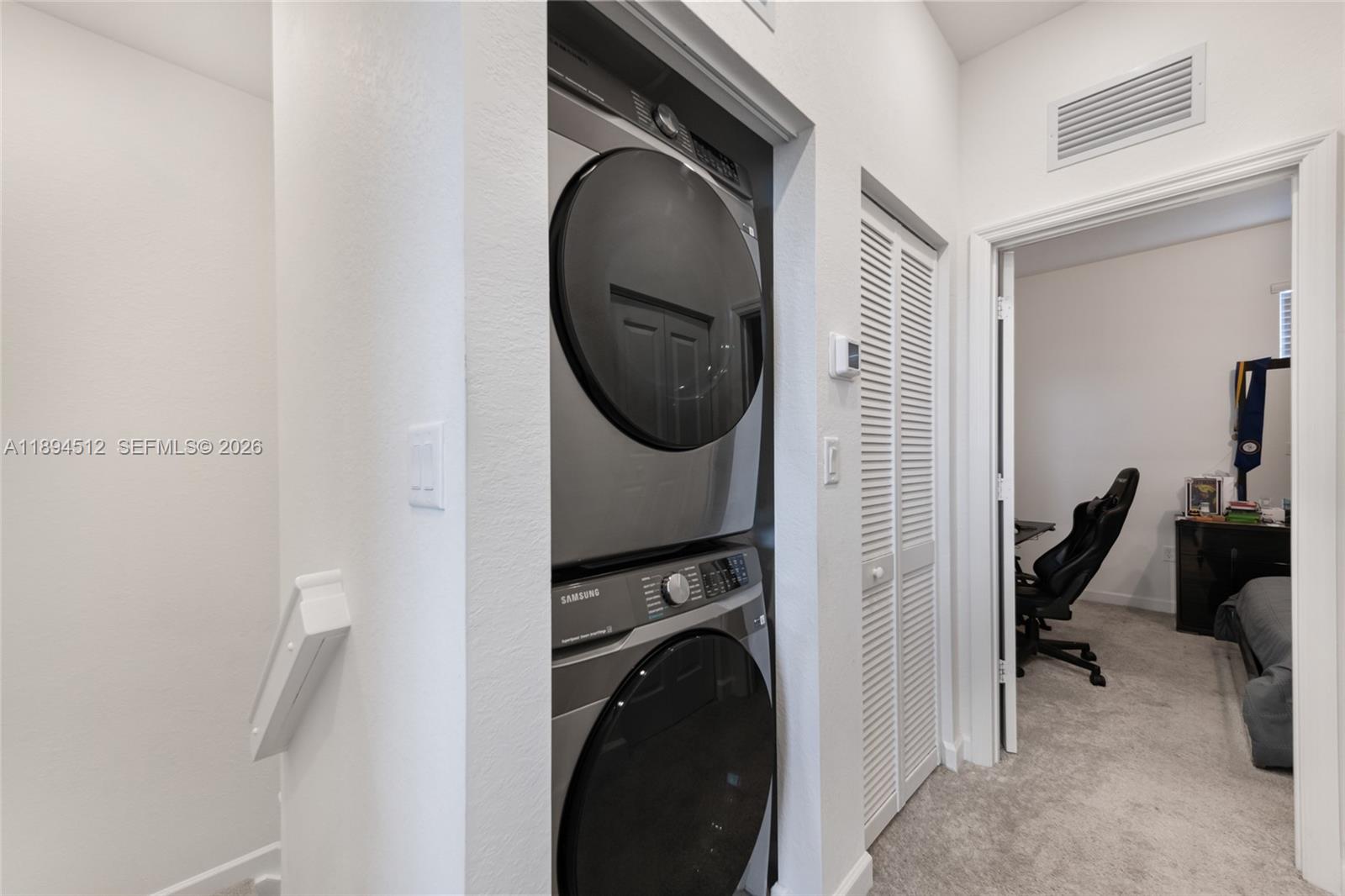 29254 Southwest 163rd Court Homestead, FL 33033 - Photo 15 of 29 a utility room with dryer and washer