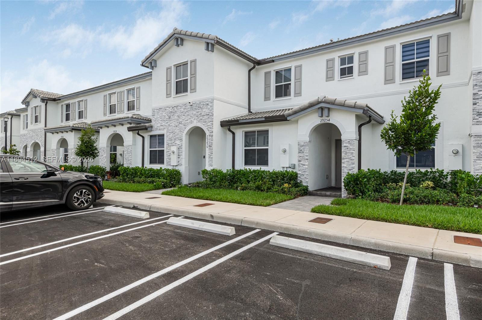 29254 Southwest 163rd Court Homestead, FL 33033 - Photo 19 of 29 a view of multiple houses with a yard