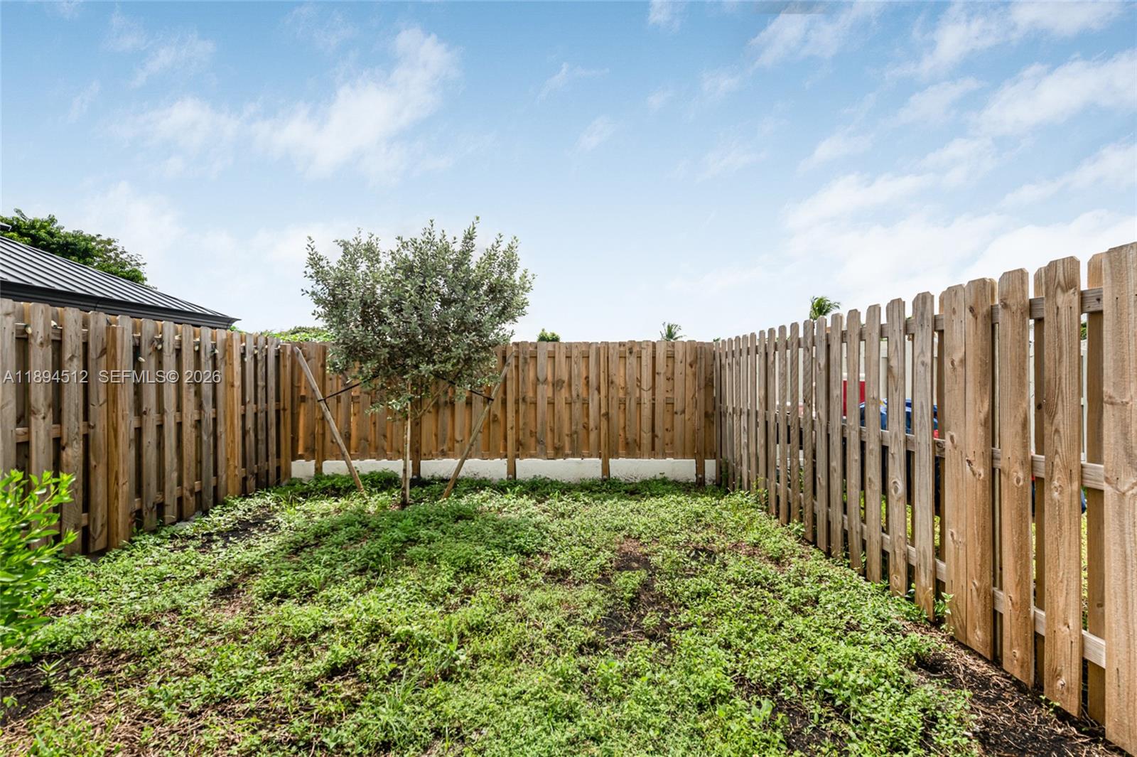 29254 Southwest 163rd Court Homestead, FL 33033 - Photo 23 of 29 a view of backyard with garden
