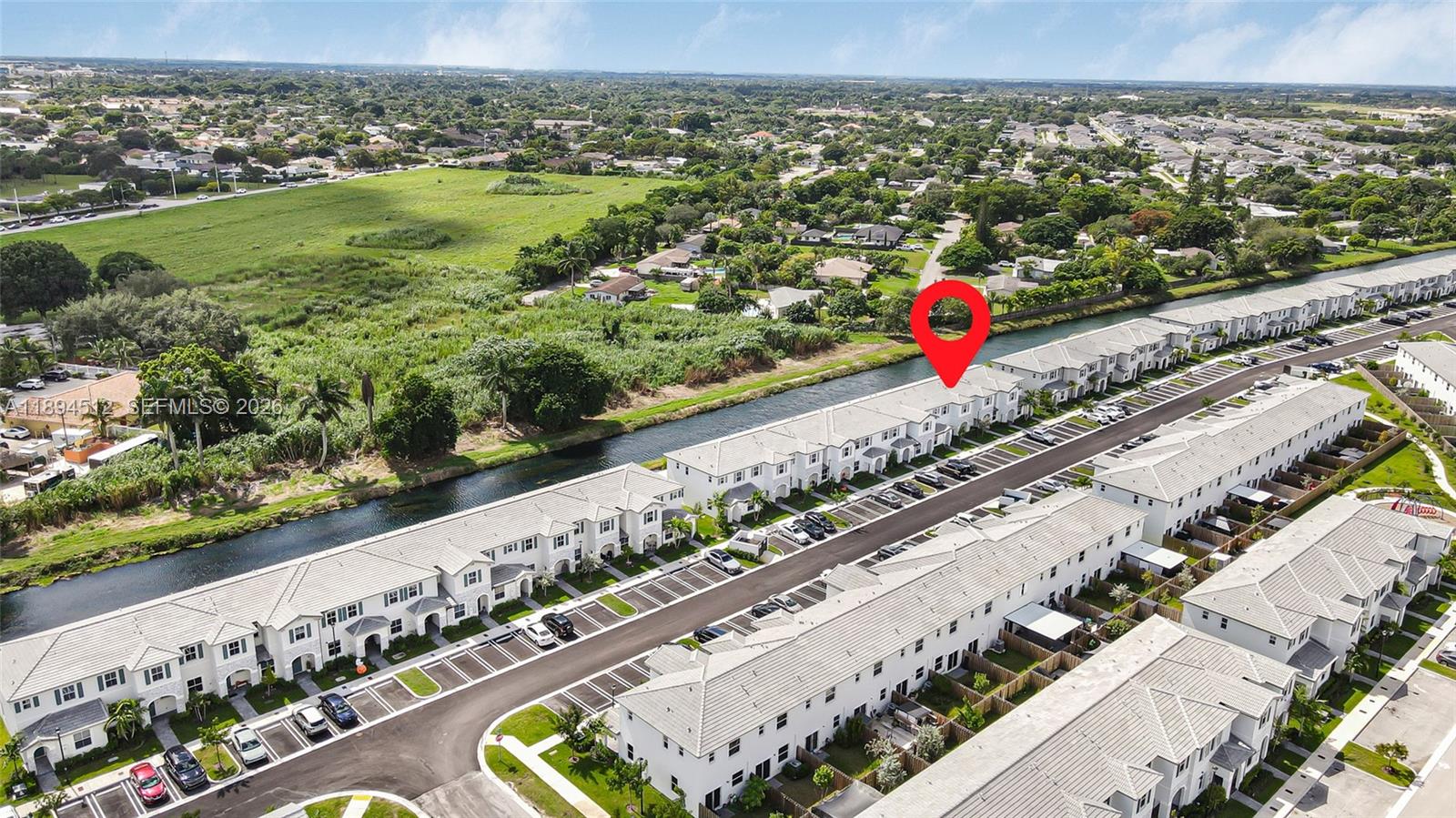29254 Southwest 163rd Court Homestead, FL 33033 - Photo 26 of 29 a view of a city and mountains from a balcony