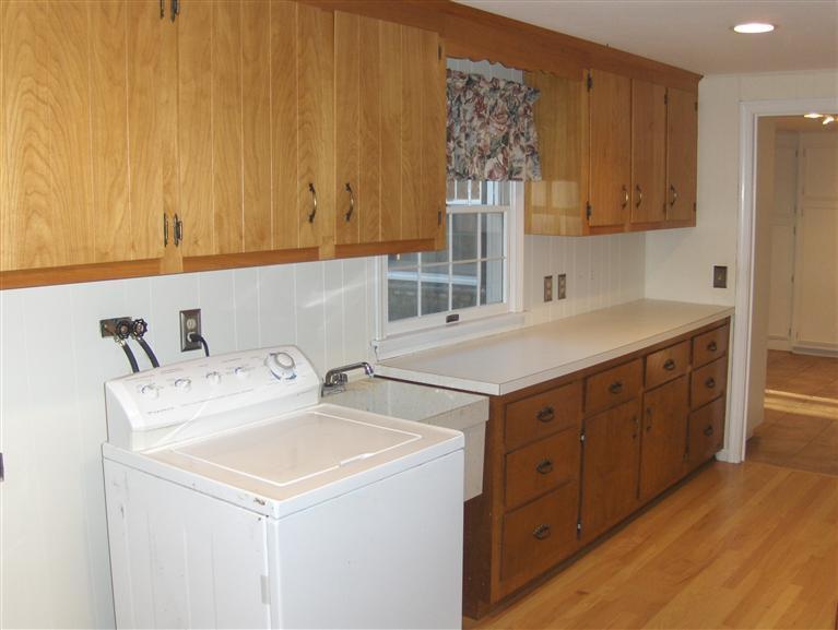 110 Round Cove Road Chatham, MA 02633 - Photo 10 of 16 a utility room with dryer and washer