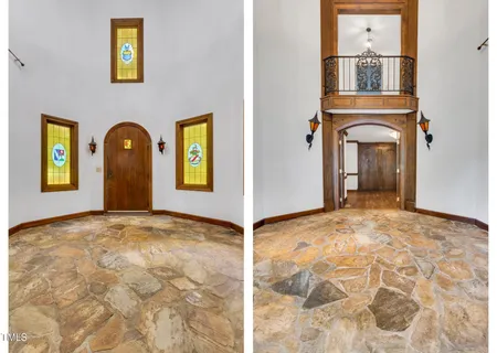 a view of an entryway with wooden floor