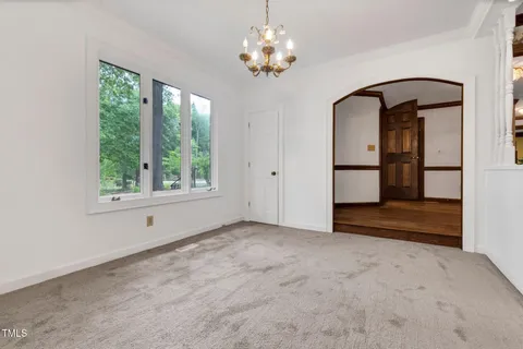 a kitchen with stainless steel appliances granite countertop a sink and dishwasher a oven with granite countertops