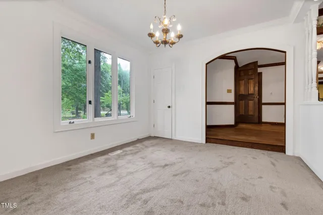 a kitchen with stainless steel appliances granite countertop a sink and dishwasher a oven with granite countertops