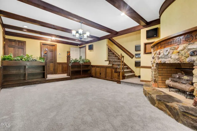 a spacious bathroom with a sink a mirror and a shower