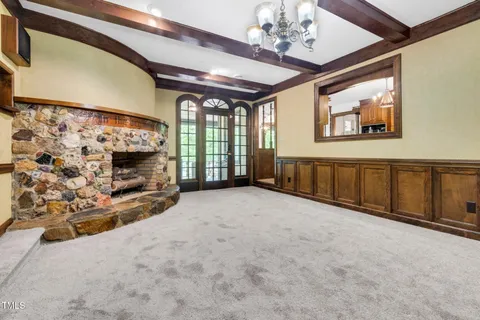 a kitchen with stainless steel appliances granite countertop a stove and a sink