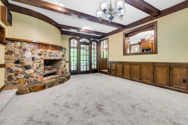 a kitchen with stainless steel appliances granite countertop a stove and a sink