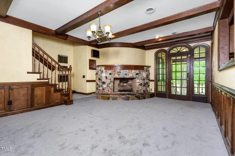 a kitchen with stainless steel appliances granite countertop a stove and a microwave