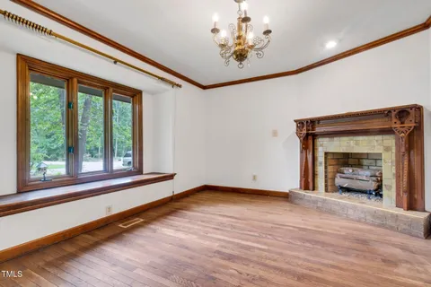a bathroom with a granite countertop sink a mirror a shower and a bathtub