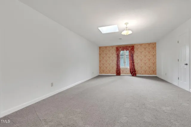 a kitchen with stainless steel appliances a refrigerator sink and cabinets