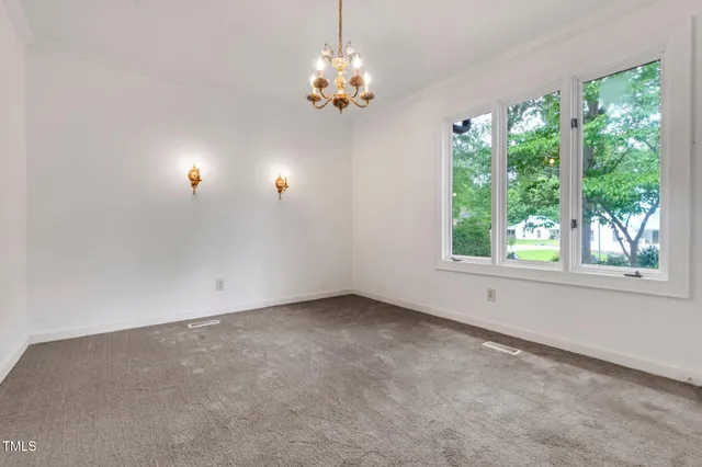 a view of a room with wooden floor and balcony