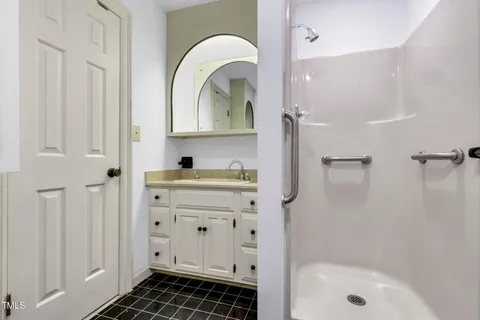 a view of a house with a street