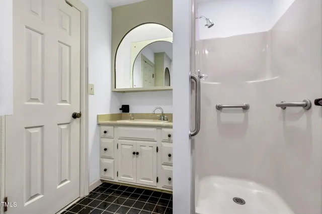 a view of a house with a street