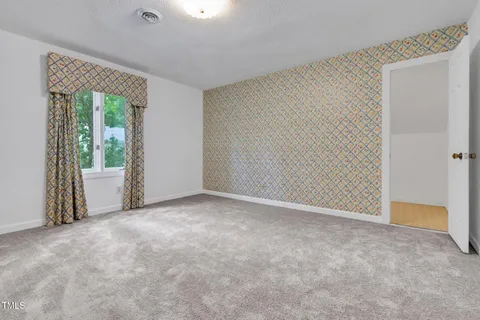 a garden view with a seating space