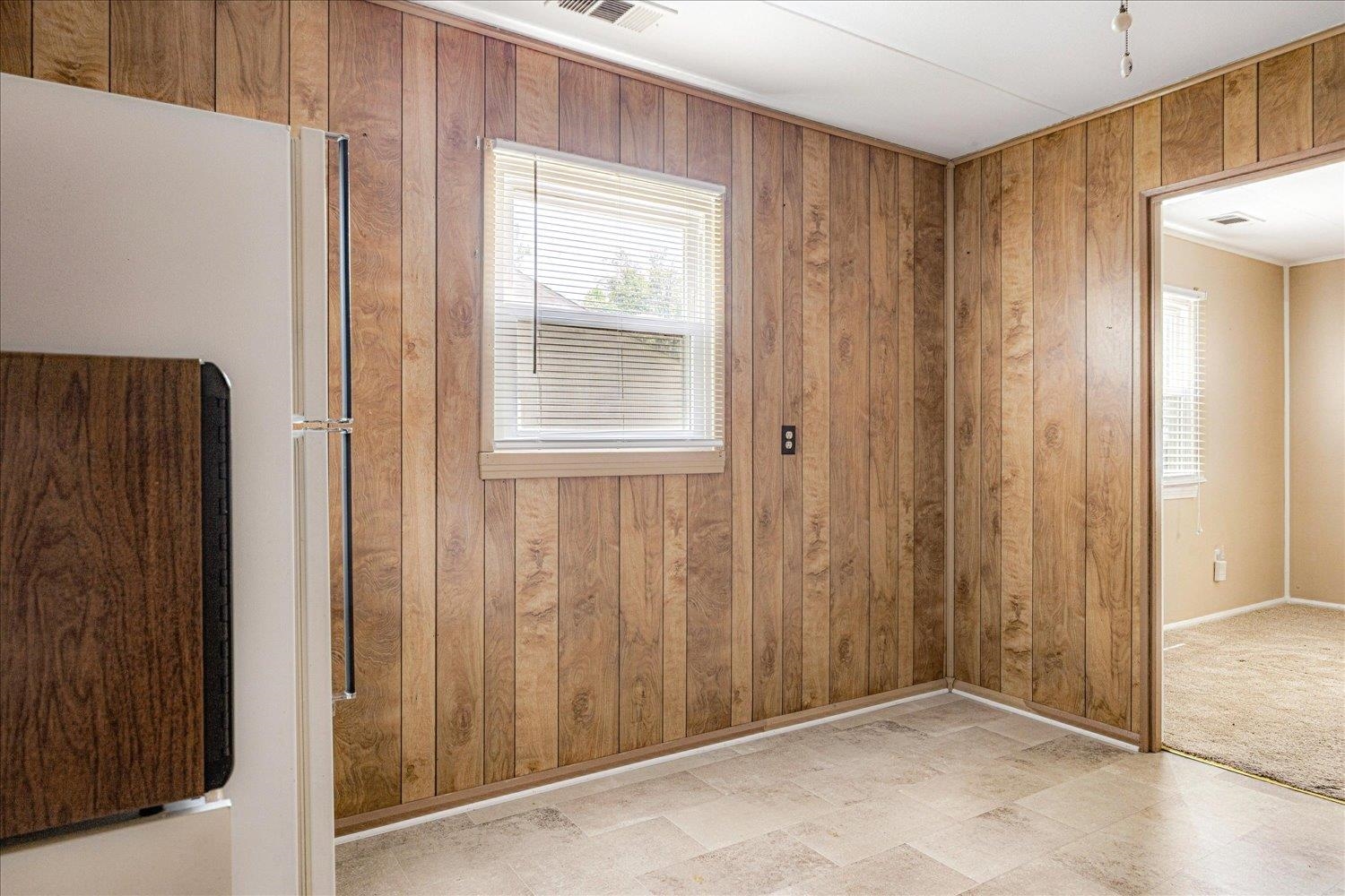 4690 Montgomery Road Millington, TN 38053 - Photo 13 of 26 Spare room with wood walls and baseboards