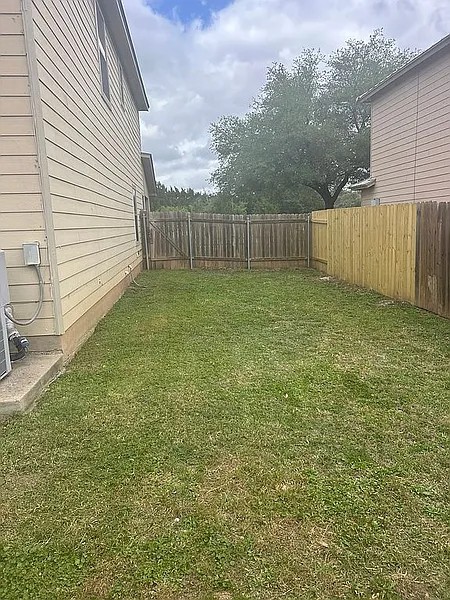 5211 Viewpoint Drive Austin, TX 78744 - Photo 28 of 29 Fenced back yard.