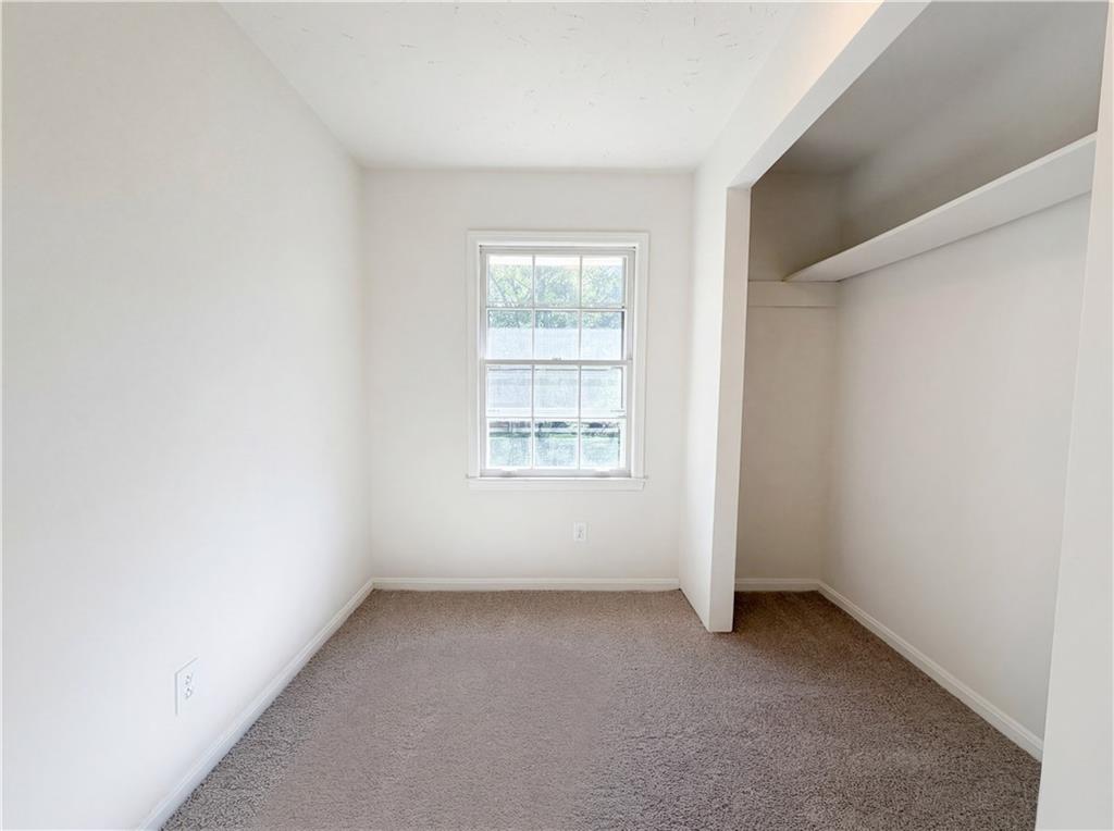 4055 Tecumseh Trail Conley, GA 30288 - Photo 18 of 30 an empty room with a window