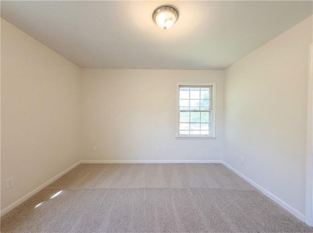 4055 Tecumseh Trail Conley, GA 30288 - Photo 22 of 30 an empty room with a window