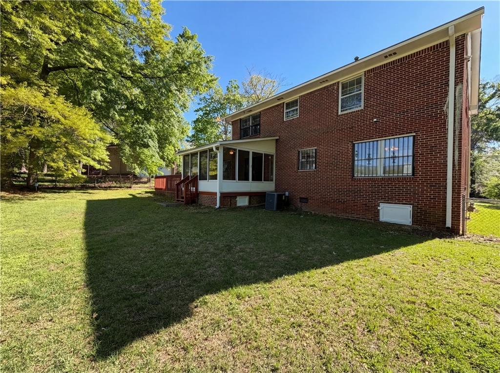 4055 Tecumseh Trail Conley, GA 30288 - Photo 28 of 30 a front view of house with yard
