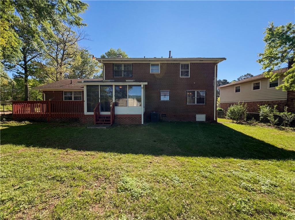 4055 Tecumseh Trail Conley, GA 30288 - Photo 30 of 30 a view of a house with a yard