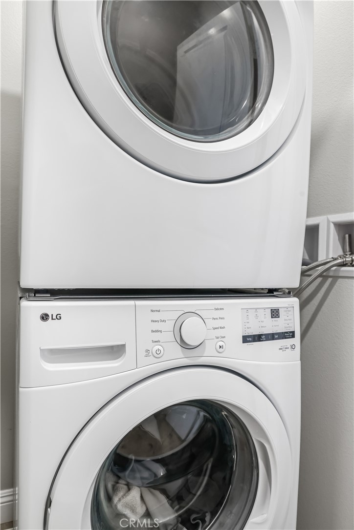 5604 Altamura Way, Unit 11 Fontana, CA 92336 - Photo 31 of 51 a close up view of washer and dryer