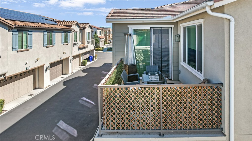 5604 Altamura Way, Unit 11 Fontana, CA 92336 - Photo 33 of 51 a house view with a outdoor space