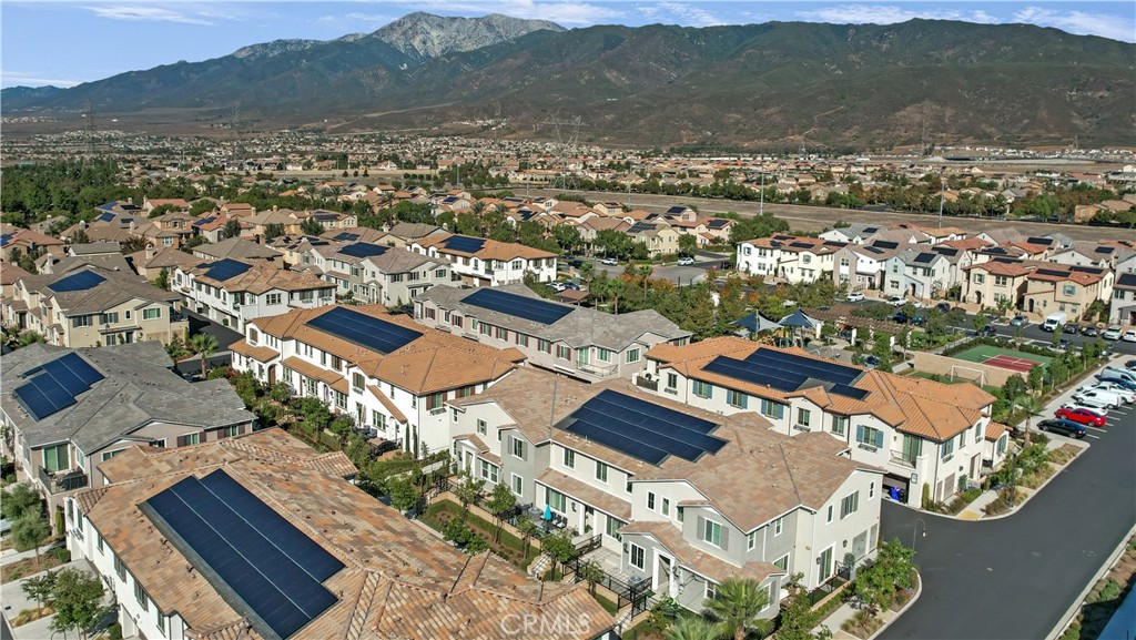5604 Altamura Way, Unit 11 Fontana, CA 92336 - Photo 36 of 51 an aerial view of residential houses with outdoor space