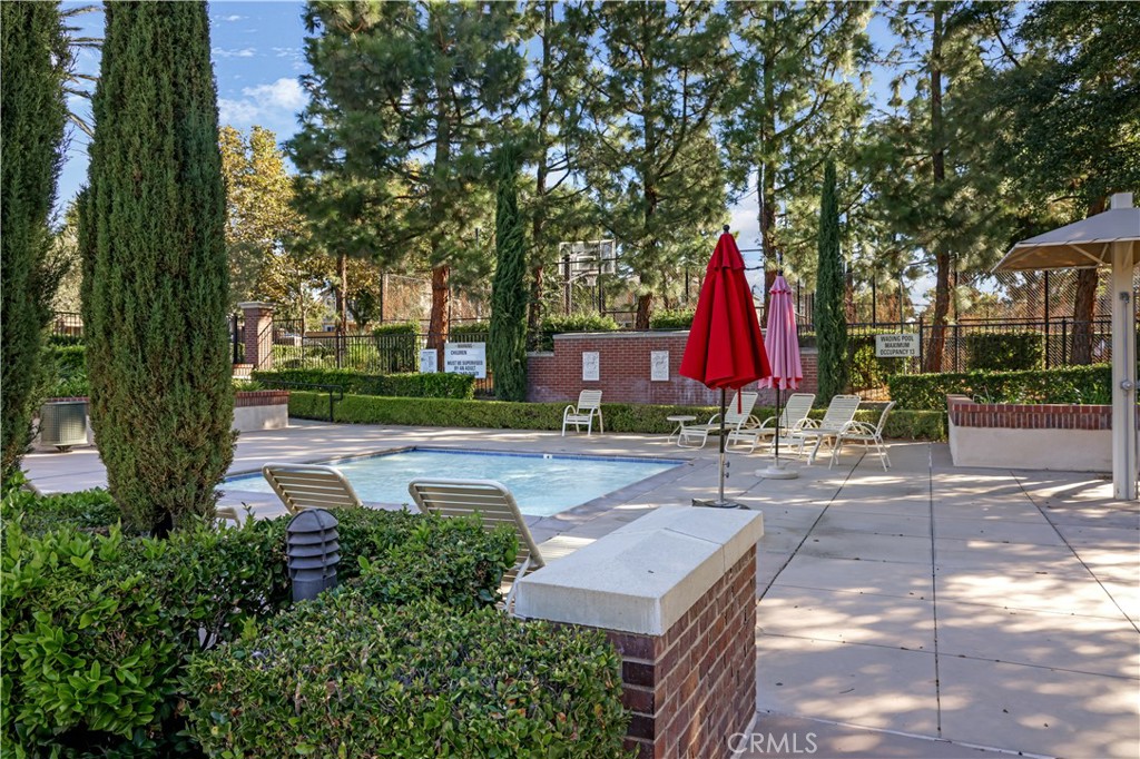 5604 Altamura Way, Unit 11 Fontana, CA 92336 - Photo 42 of 51 a view of a park with plants and trees