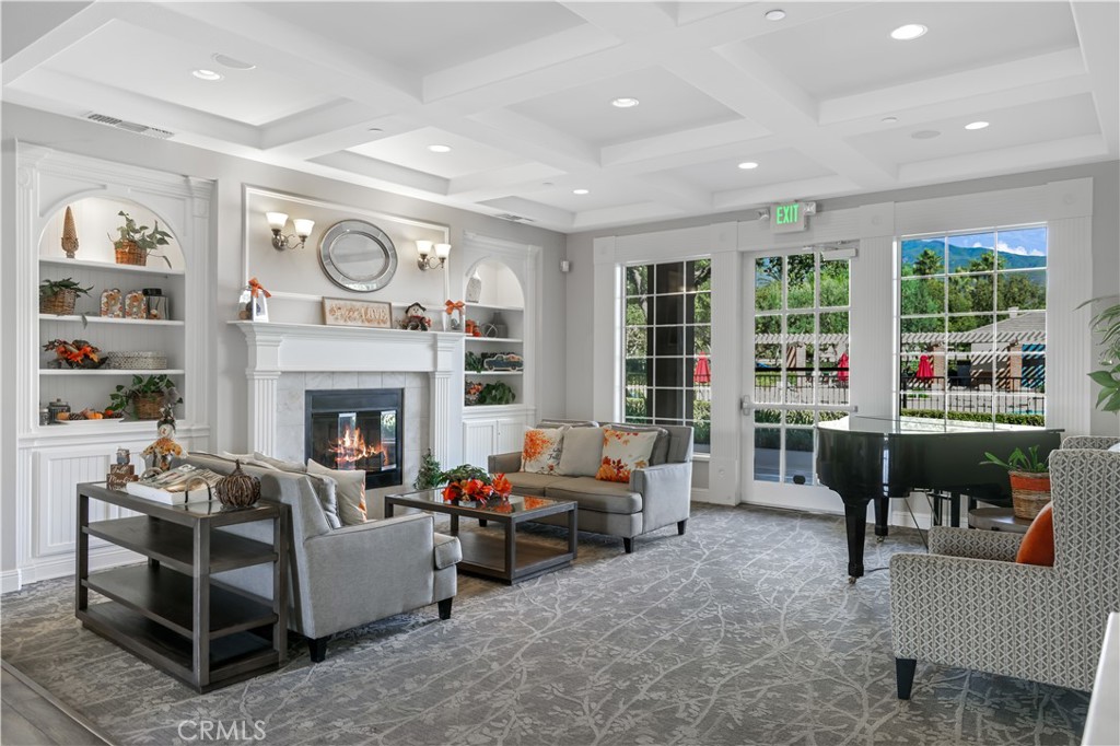 5604 Altamura Way, Unit 11 Fontana, CA 92336 - Photo 47 of 51 a living room with furniture fireplace and window