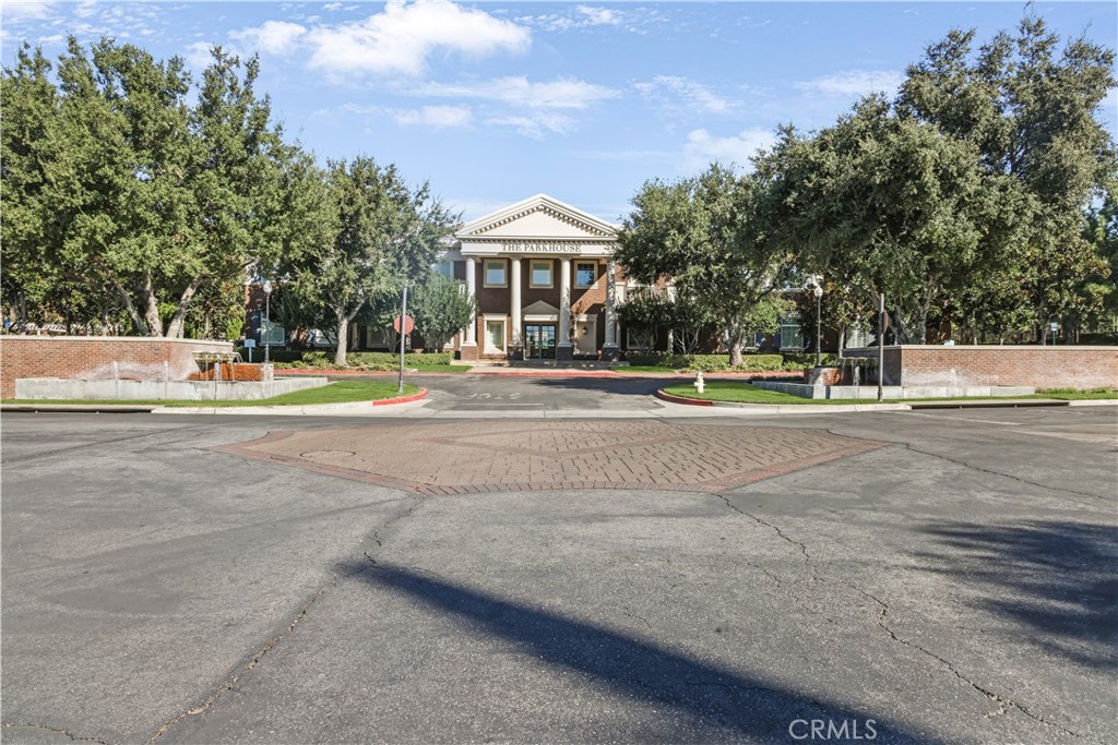 5604 Altamura Way, Unit 11 Fontana, CA 92336 - Photo 50 of 51 a view of big yard and large trees