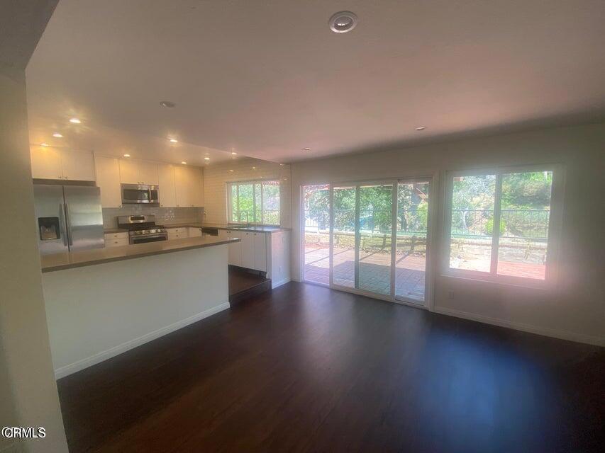 5307 Maple View Circle Camarillo, CA 93012 - Photo 4 of 7 a view of kitchen with wooden floor and windows