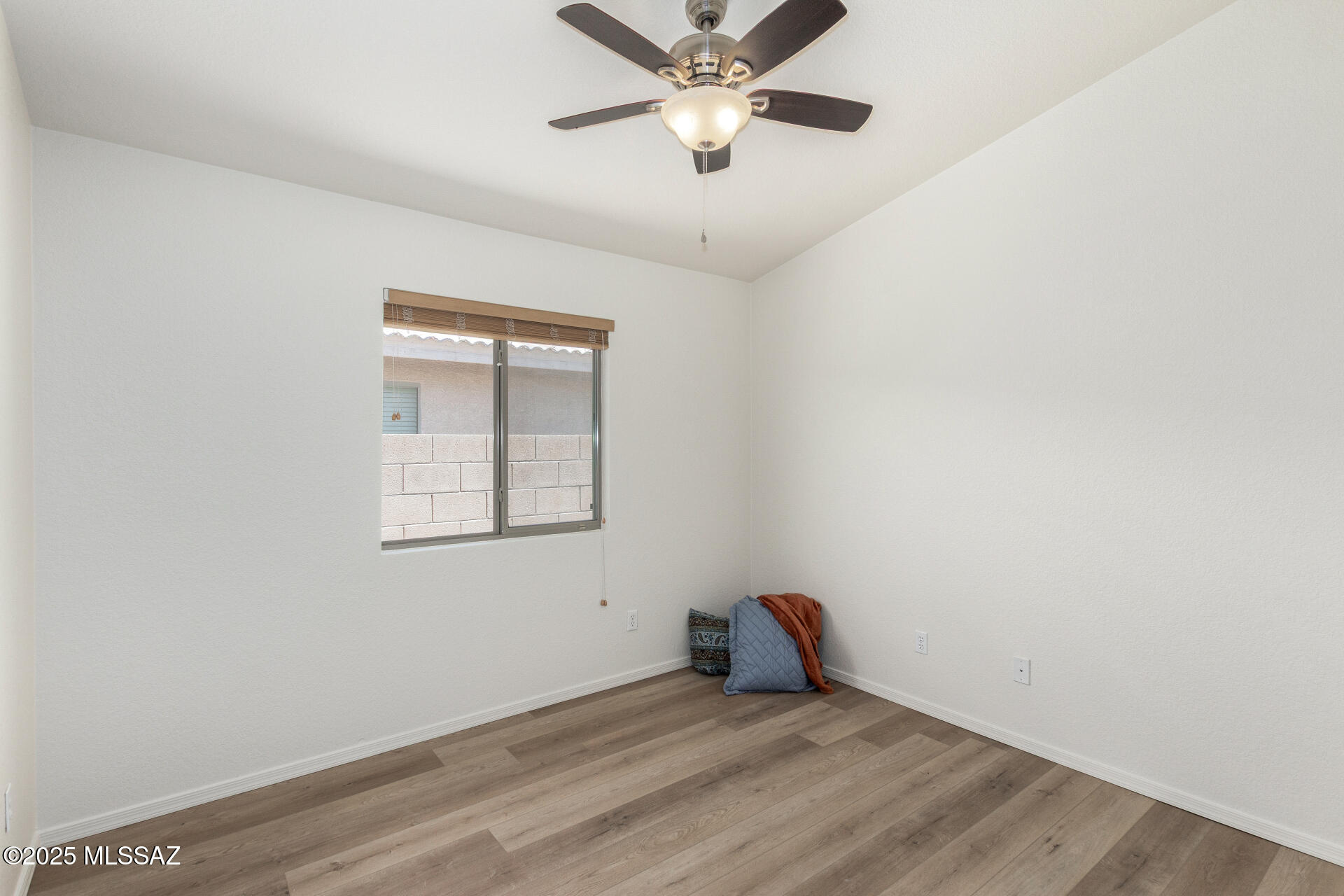 1516 North Old Ranch Road Tucson, AZ 85745 - Photo 14 of 27 a view of an empty room with a window