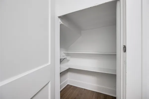 a kitchen with cabinets and appliances