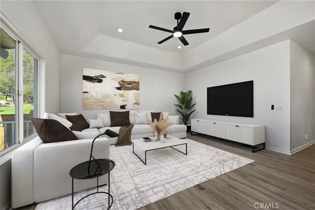 a view of kitchen with granite countertop cabinets and wooden floor