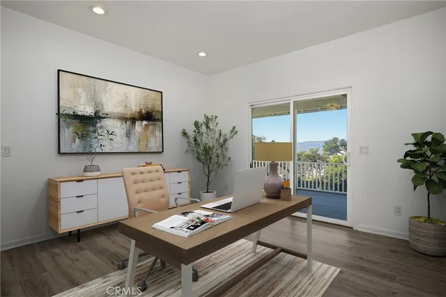 a bathroom with a tub sink double vanity and granite